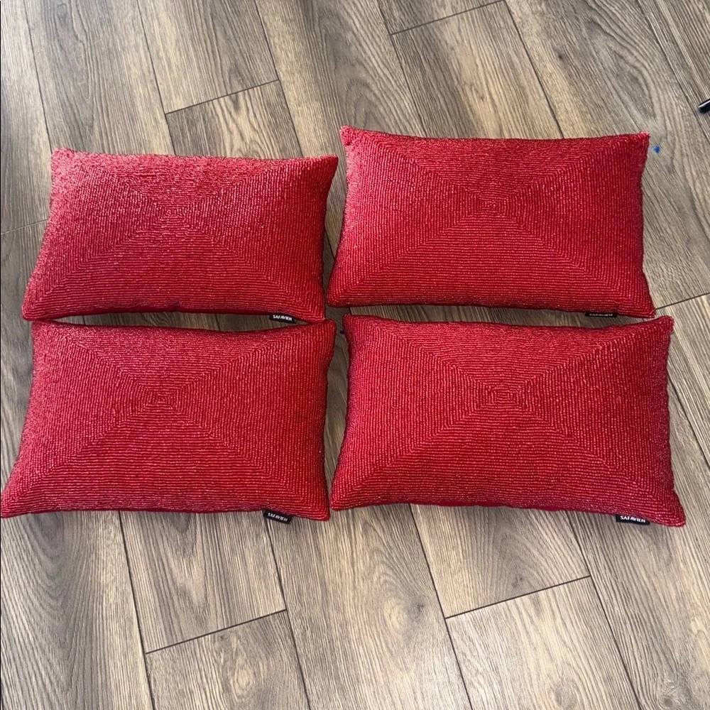 4 SAFAVIEH Beautiful Beaded toss pillows in a rich jewel tone red